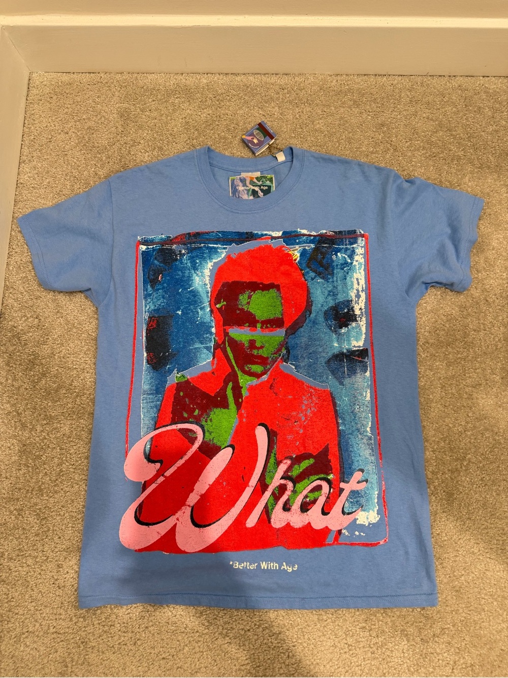 Light Blue Graphic Crew Tee with Bold Multicolor Portrait